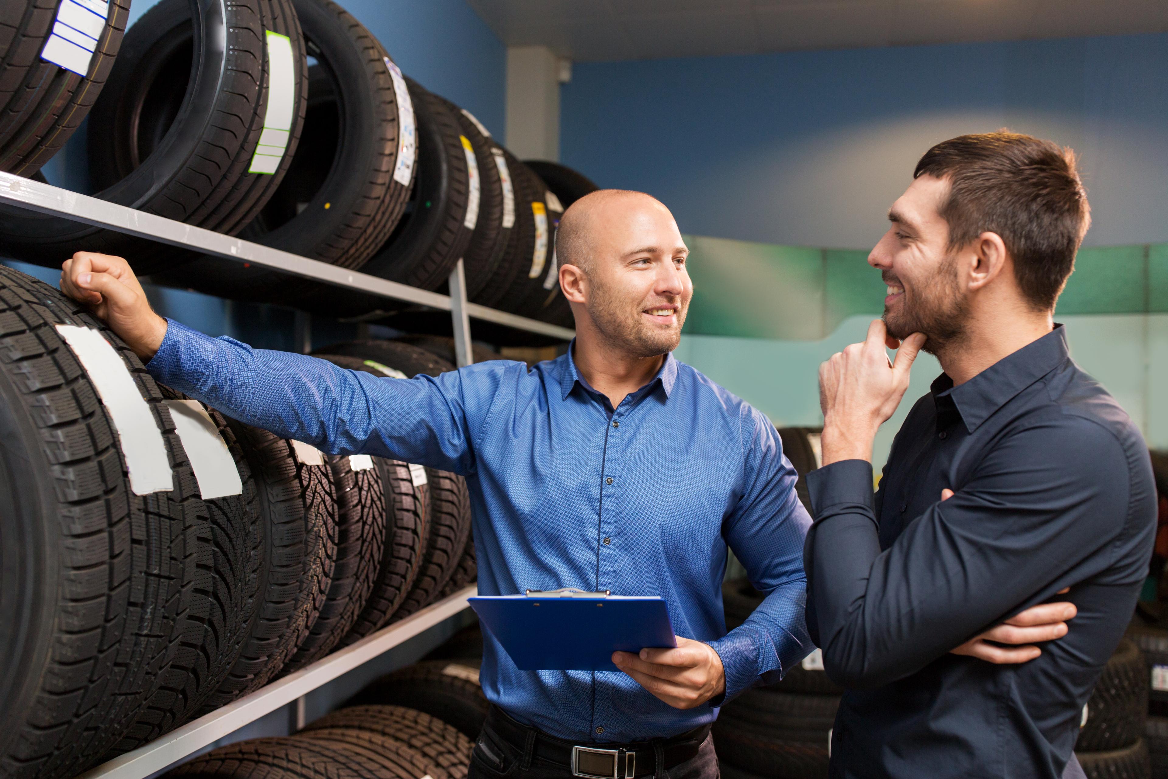 A customer shopping for new tires and exploring a wide selection of tires at a store, finding the perfect fit for their vehicle's performance, safety, and style needs.
