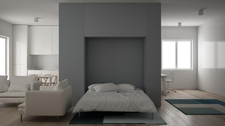 A murphy bed within a loft room that is subtle but conveniently placed.